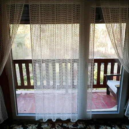 Nad Jeziorem W Otulinie Lasu Holiday home *