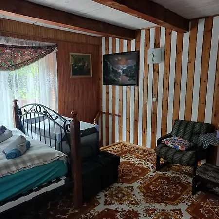 Nad Jeziorem W Otulinie Lasu Holiday home *
